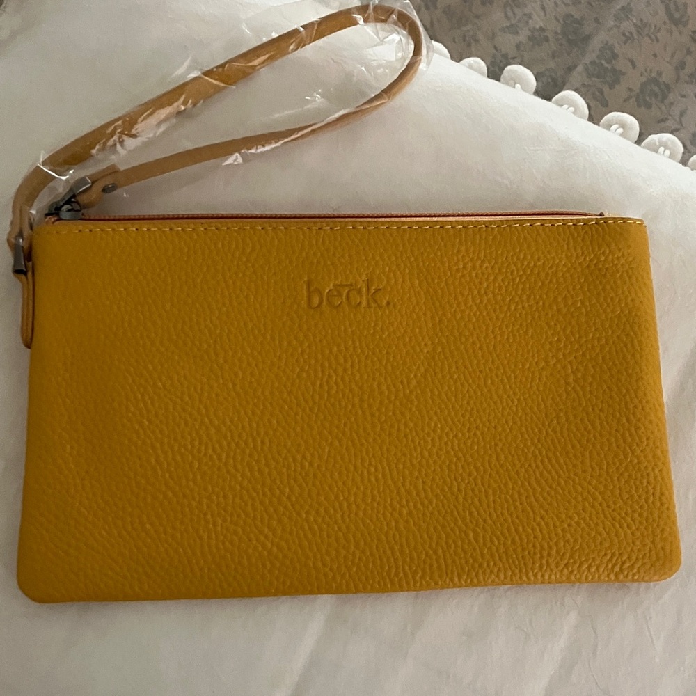 Anna Beck Mustard Wristlet Clutch with coin purse with credit card slots.